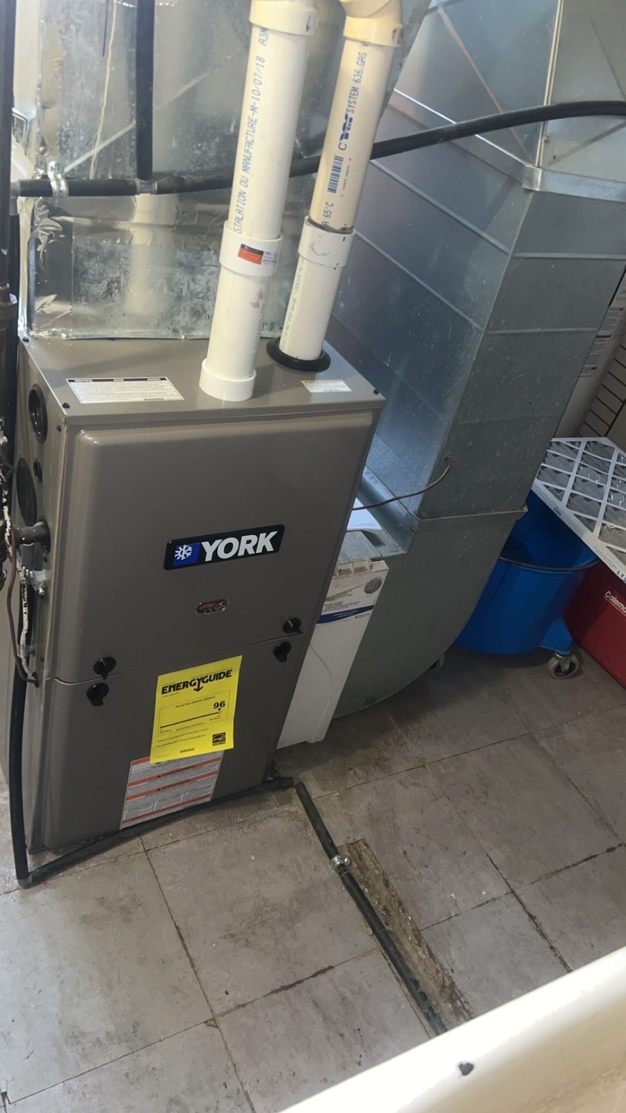 York high-efficiency furnace installed in a residential mechanical room